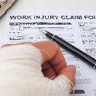 Filling-out-workers-comp-paperwork-after-injury-at-work